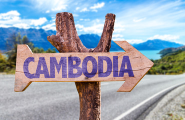 Cambodia wooden sign with road background