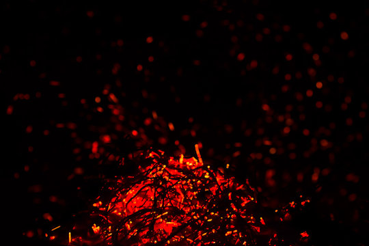 red sparks on a black background