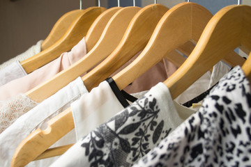 row of white dress in wardrobe at home
