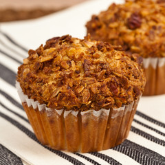 Crunchy Granola Peach Muffins with Butter Pecan Toppings