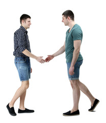 Two handsome young men isolated on white