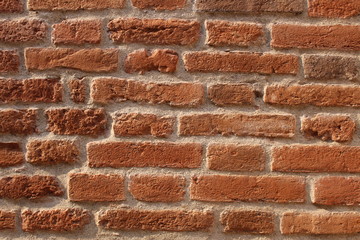 Red old brick wall texture as a background