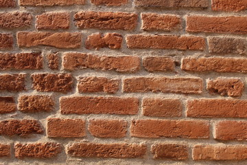 Red old brick wall texture as a background