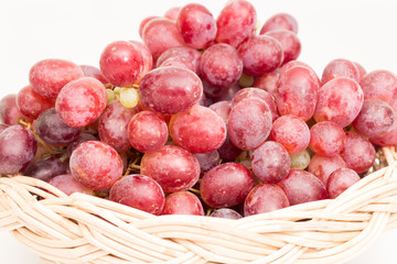 red grapes in basket