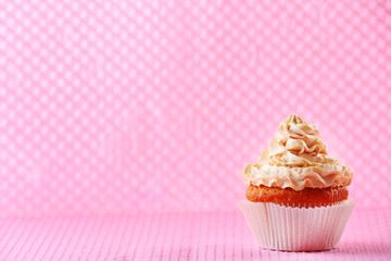 Birthday cupcake on color background