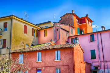 vivid colors of the houses of a rural village in the hills of No