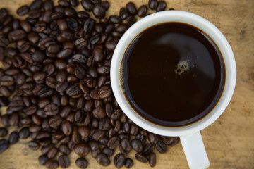 Coffee beans background on wooden, Fresh coffee beans