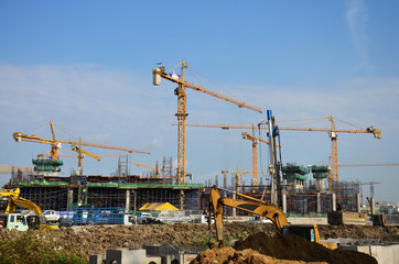 Fototapeta na wymiar Builder worker with Machinery Building Construction Site