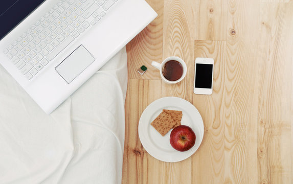 Modern Still Life Of Morning Breakfast Routine With Computer Dev