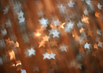 Festive background with gold and silver stars