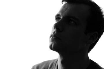 black-and-white portrait of a sad man