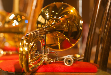 Trombone lying on a chair closeup