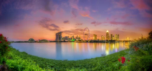 Fototapete Stadt am Wasser Skyline von Singapur bei Sonnenuntergang
