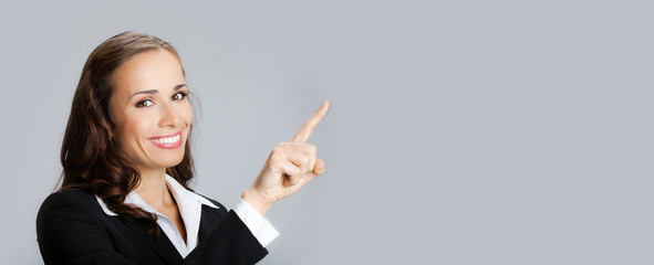 Businesswoman showing copyspace