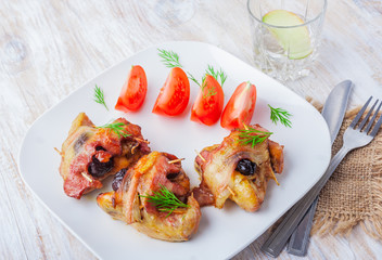 Baked chicken wings with plum