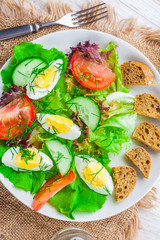 Fresh salad with egg and vegetables