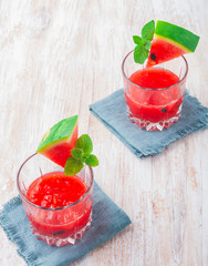 watermelon cocktail with mint leaf in a glass
