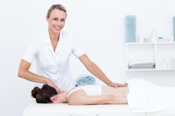 Physiotherapist doing back massage