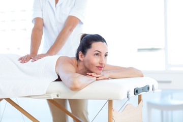 Woman having back massage