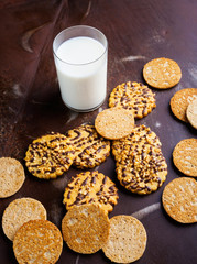 Sweet cakes and a glass of fresh milk