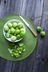 Brussels sprouts on wood table