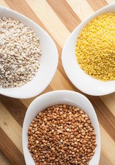 Three kinds of groats: buckwheat, millet and barley groats
