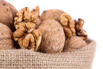 Walnuts in burlap bag.