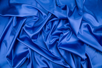 Blue silk drapery.