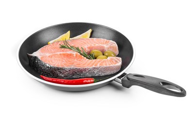 Fresh salmon steak on pan.