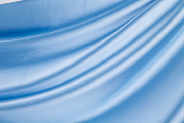 Blue silk drapery.