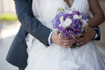 Wedding couple with bouquet