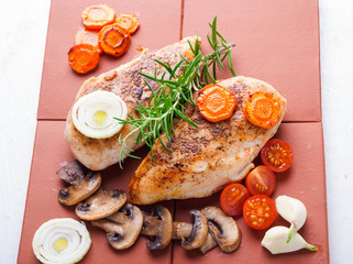Baked chicken breast with mushrooms and carrots