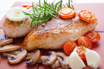 Baked chicken breast with mushrooms and carrots