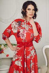 Beautiful fashionable woman with evening make-up in jewelry.