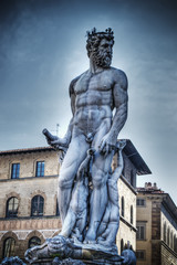 Fototapeta na wymiar Neptune statue in hdr in Florence