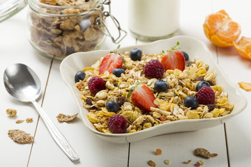 Light, delicious breakfast with cereal and fruit.