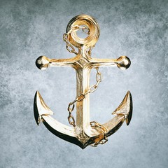 Highly detailed golden anchor on grey background