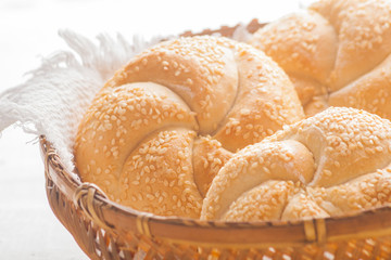 Buns with sesame in basket.