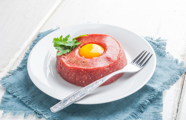 Beef tatar with egg.