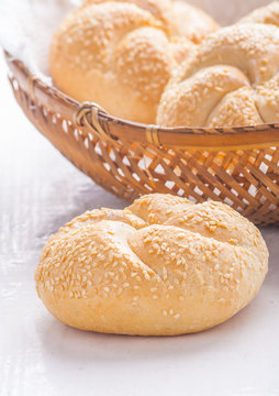 Buns with sesame in basket.