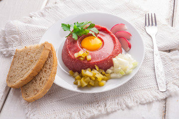Beef tatar with egg.