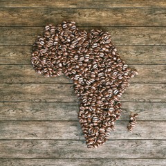 Map of Africa made of roasted coffee beans on wooden background