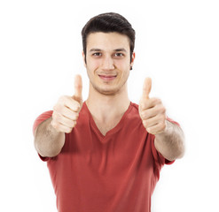 Young man showing OK sign with his thumb up