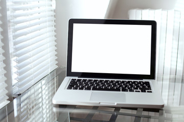 laptop with empty screen in modern interior