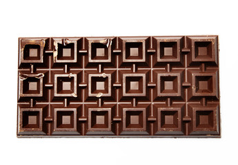 Big plate of dark chocolate on white background
