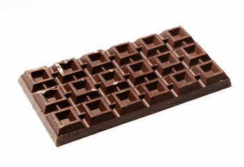 Big plate of dark chocolate on white background