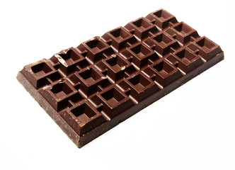 Big plate of dark chocolate on white background