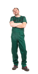 Worker in green overalls