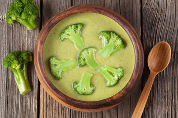 Restaraunt cream of broccoli green soup recipe in bowl with