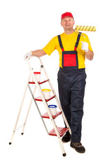 Worker on ladder with roller